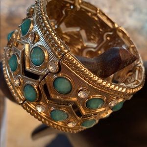 Gold tone/ rhinestone and green stone bracelet